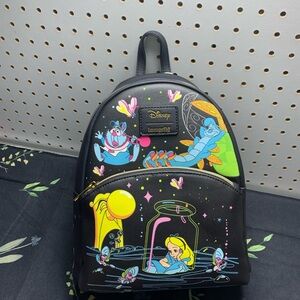 Loungefly Black Alice in Wonderland NWT  Glows in the Dark Backpack